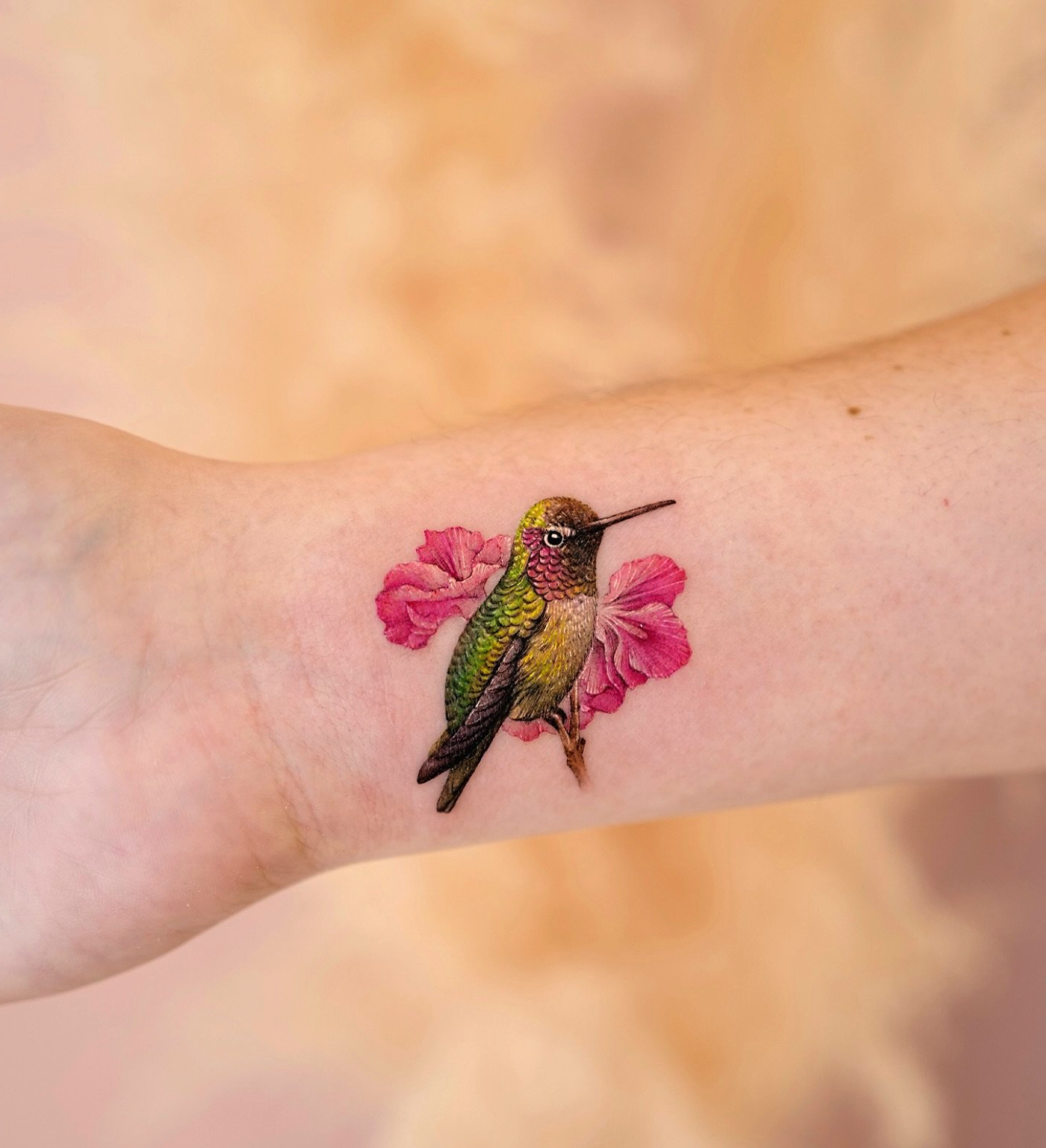 Vibrant Hummingbird with Pink Blooms
