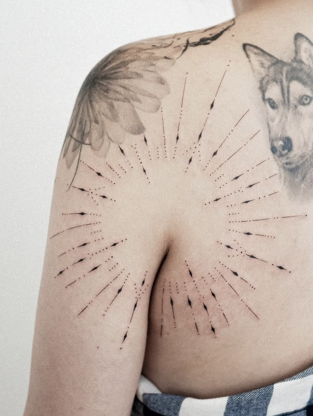line geometric style tattoo by Niko